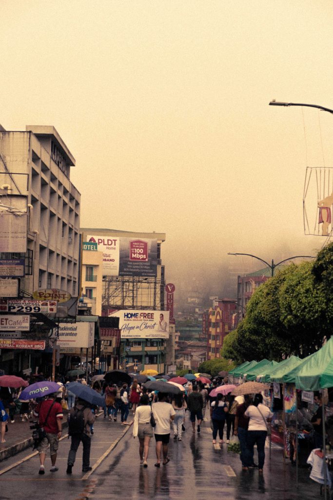 A foggy and rainy scene of Session Road.